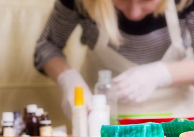 Decorative image only of woman making soap