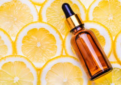 Fragrance bottle and lemon slices
